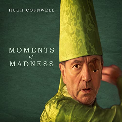 Album cover for Hugh Cornwell’s “Moments of Madness” featuring a man in a green hat.