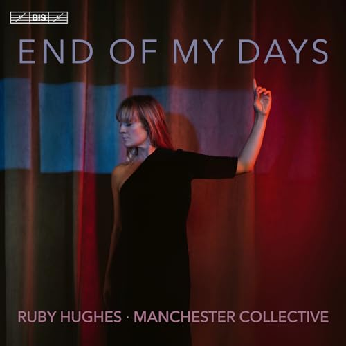 CD cover: woman in black dress against a red and blue backdrop.