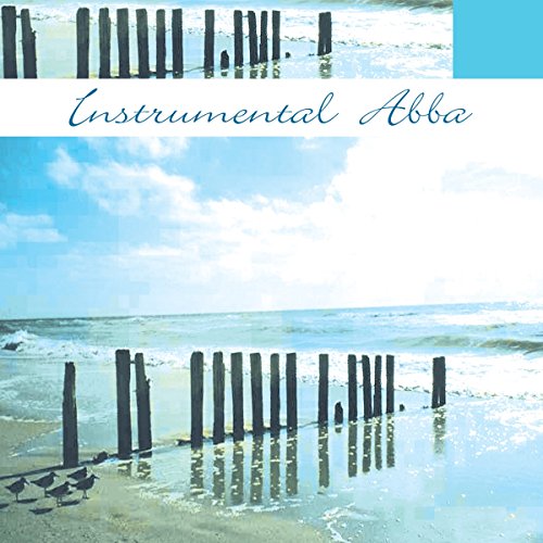 CD cover: beach scene with piano keys emerging from the sand.