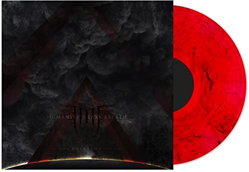 Red vinyl record with album cover depicting dark, stormy sky and a triangle.