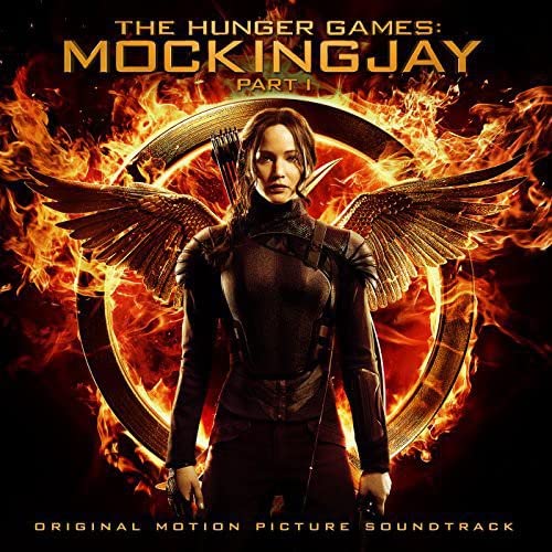 Katniss Everdeen with Mockingjay wings against a fiery, circular backdrop.