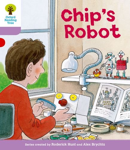 Boy building robots at a table with tools and a lamp.