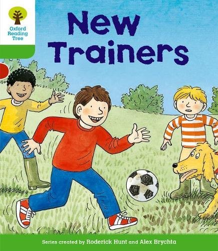 "Children's book cover showing three boys and a dog playing soccer in a field."