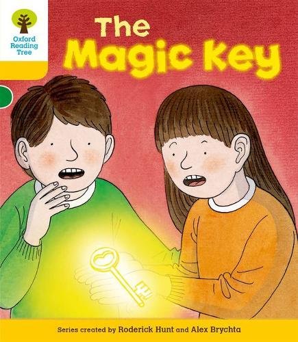 A boy and girl looking surprised at a glowing magic key on a book cover.