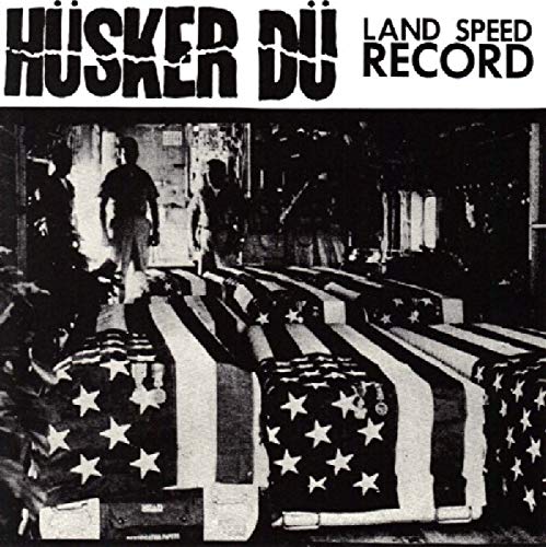 Husker Du album cover: draped American flags and figures in a hall.