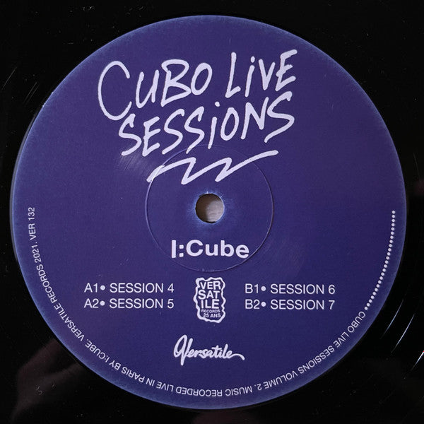 Black vinyl record with white text: "Cubo Live Sessions Volume 2" and tracklist.