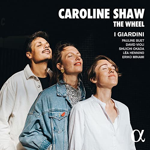 CD cover featuring three people looking upwards, album title "The Wheel".