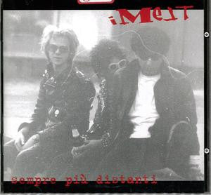 Black and white CD cover featuring three figures with obscured faces.