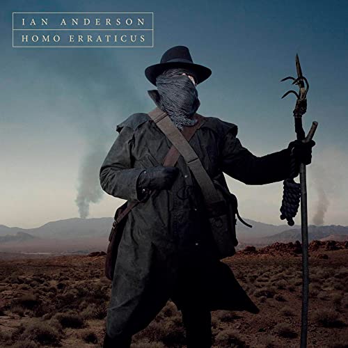 Ian Anderson album cover: figure in dark clothing with a staff, desert background.