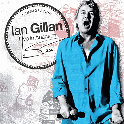 Ian Gillan singing into a microphone against a background of maps and road signs.