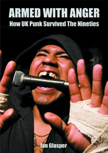 Book cover: singer with microphone, dark background, title “Armed With Anger.”