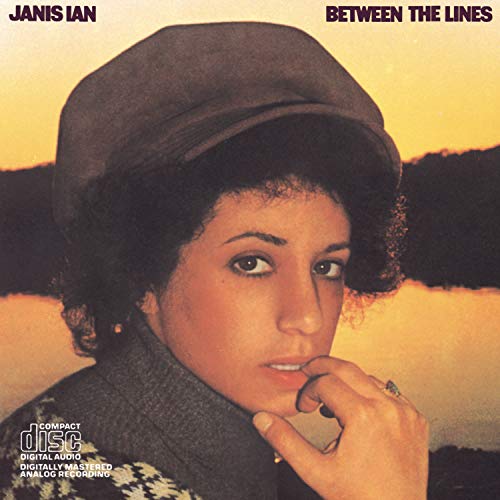 Janis Ian album cover, "Between The Lines", portrait of a woman in a cap.