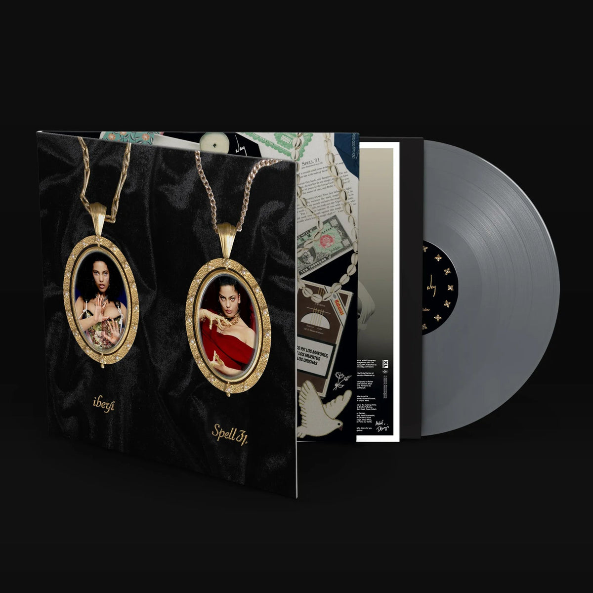 Ibeyi's "Spell 31" vinyl record with ornate portrait cover art.