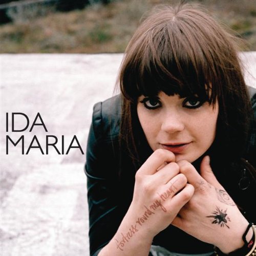 Ida Maria album cover, close-up portrait of a woman with dark hair.
