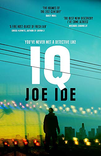 Book cover for "IQ" featuring a silhouetted figure and city lights.