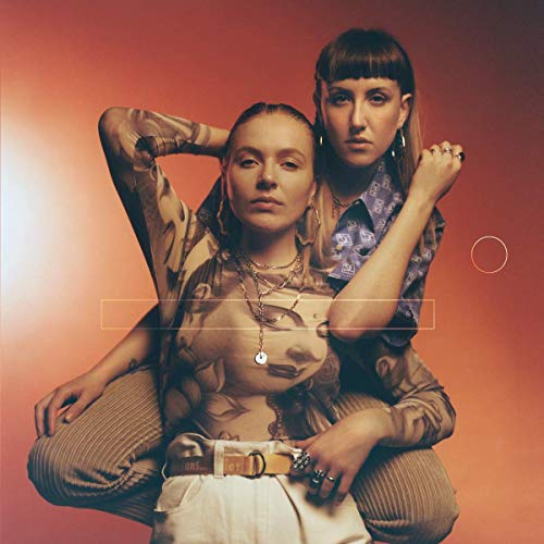 Album cover for Ider’s “Emotional Education” featuring two women posing closely.