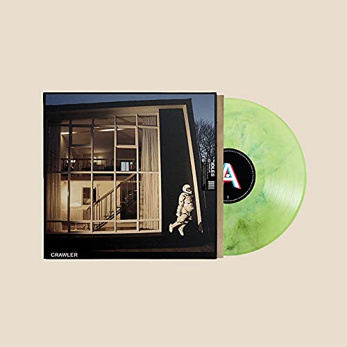 Idles’ “Crawler” vinyl record with a green swirl and building cover.