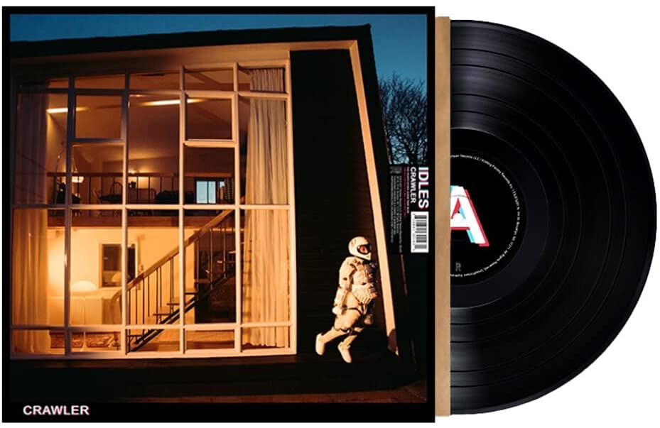 Idles' "Crawler" deluxe vinyl record with house and figure cover art.