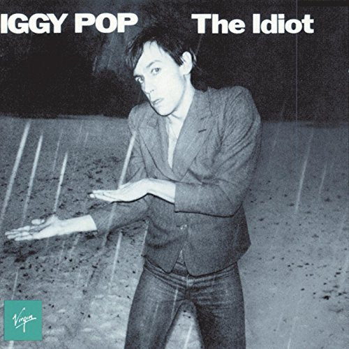Iggy Pop album cover, “The Idiot”, showing a man in a suit.