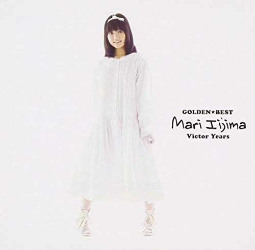 Mari Iijima in a white dress, album cover for “Golden Best.”
