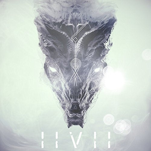 A wolf's head with glowing eyes and a symbol on its forehead.