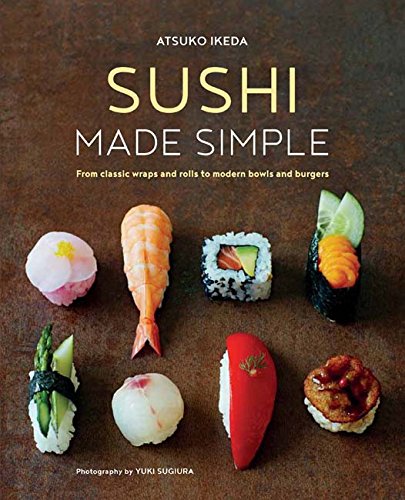 Cookbook cover featuring various colorful sushi pieces on a brown surface.