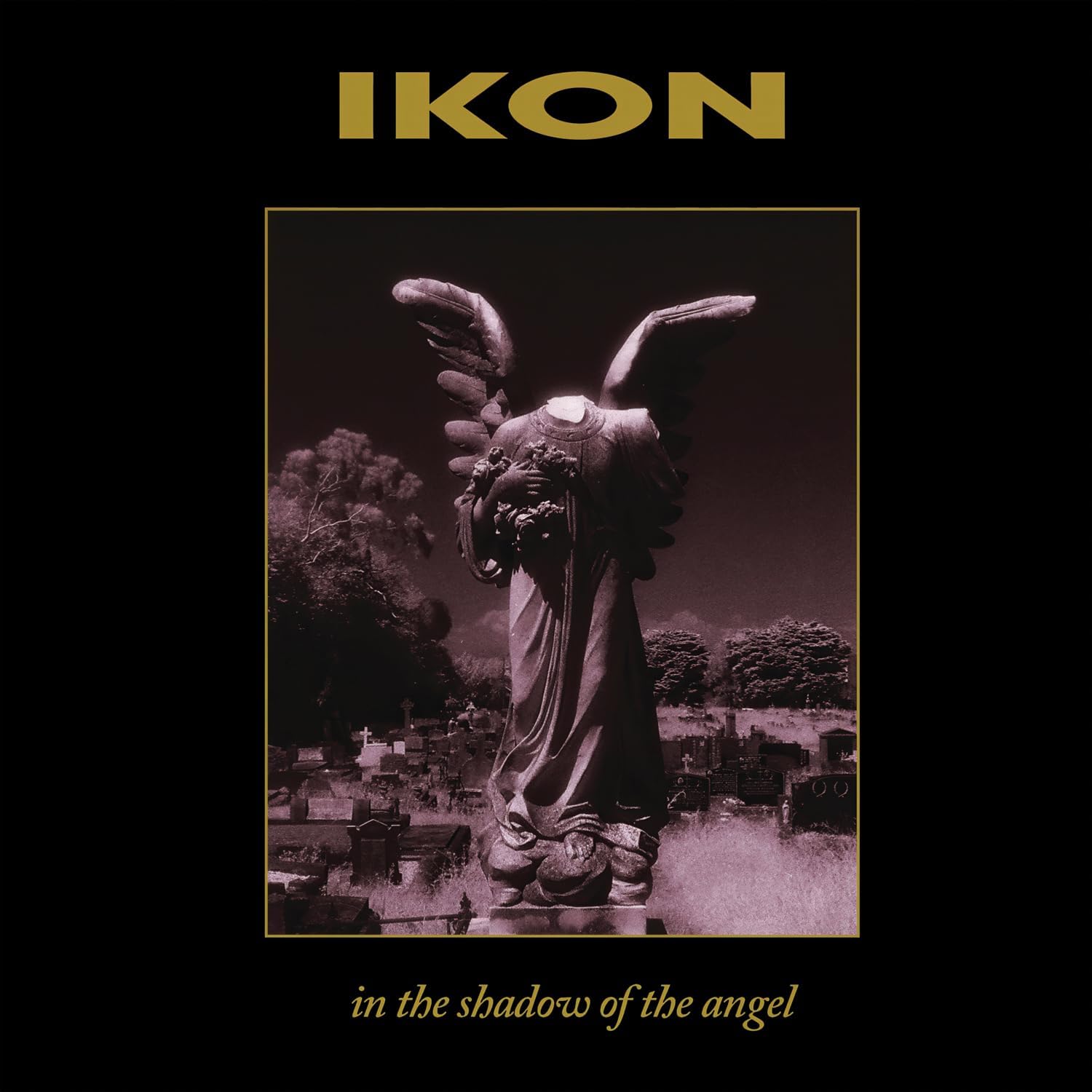 Angel statue in a graveyard, album cover for Ikon's "In The Shadow Of The Angel.