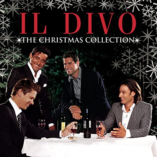 Four men in suits sit at a table with wine against a snowflake background.