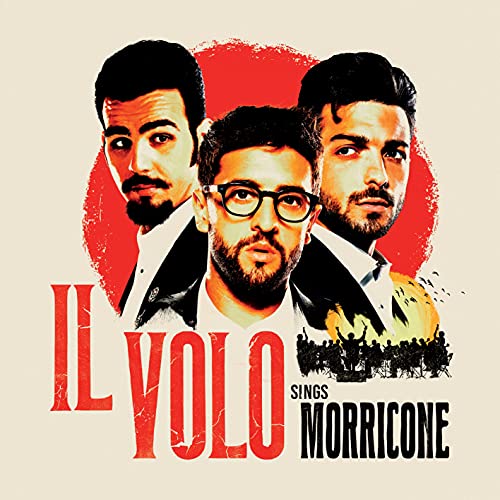 Il Volo album cover featuring three men against a red and beige background.
