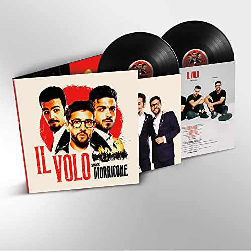 Three men on vinyl record cover with two records and inner sleeve visible.