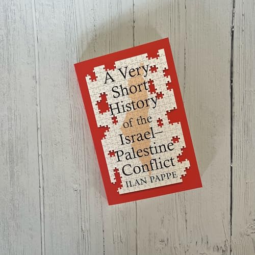 Book cover with a red background and a white jigsaw puzzle piece overlay.