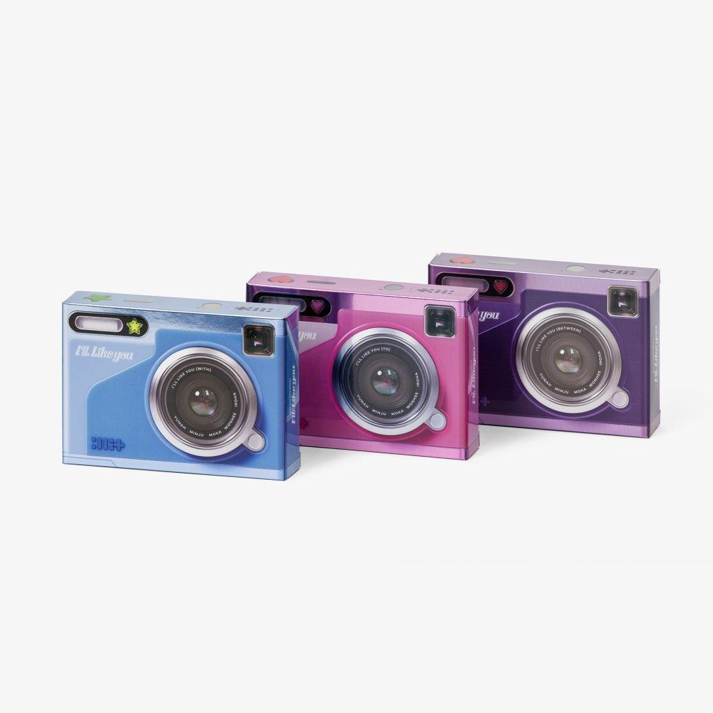 ILLIT CD packaging shaped like three colorful vintage cameras.