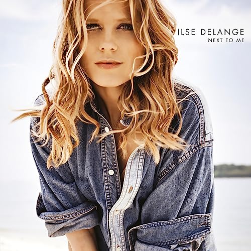 Album cover for Ilse Delange’s “Next To Me” featuring a portrait of the artist.