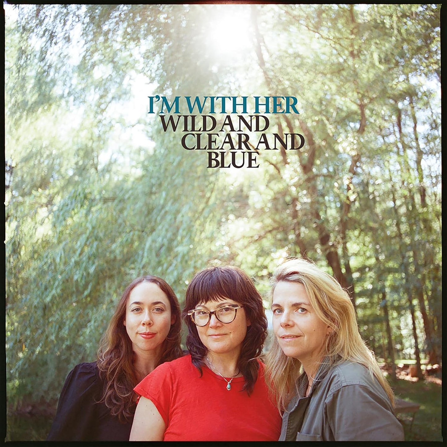 CD cover featuring three women in front of blurred trees.