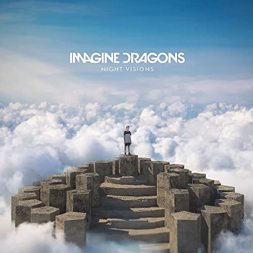 A person stands on a stone pillar above clouds, with album text above them.