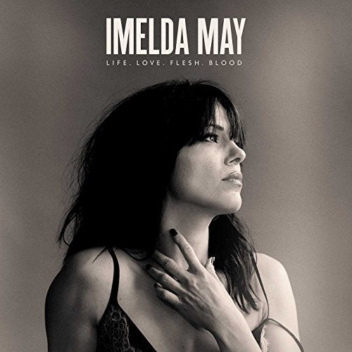 Black and white portrait of Imelda May with hand on neck, album cover art.