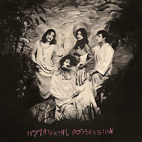 Black and white album cover featuring three people in flowing garments.