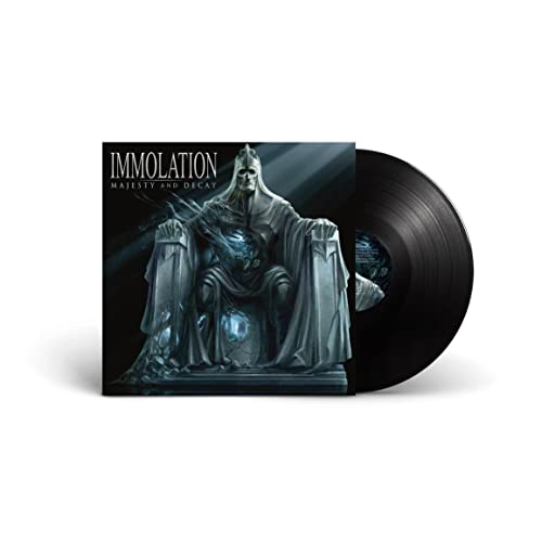 Vinyl record with album cover featuring a dark, regal statue.