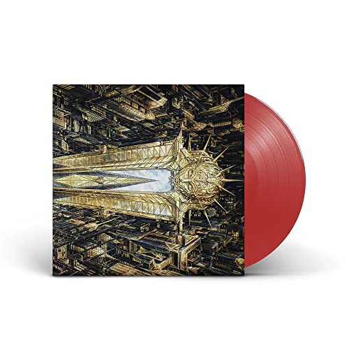 Vinyl record with red disc and album art of a golden cityscape.