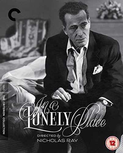 Black and white film cover featuring Humphrey Bogart in a suit.
