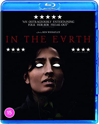 Blu-ray cover for In The Earth featuring a person with glowing white eyes.