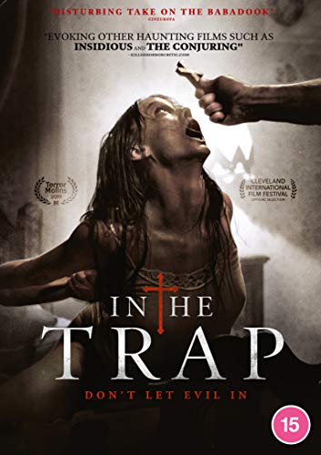 DVD cover for "In The Trap" featuring a possessed woman and a pointing hand.