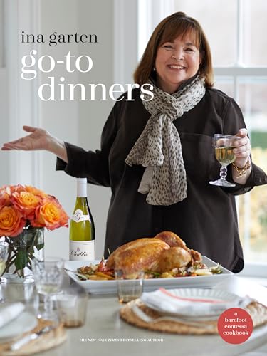 Cookbook cover featuring Ina Garten with a roasted chicken and wine.
