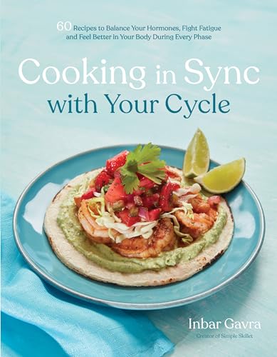 Cookbook cover with shrimp tacos and text about cycle-based cooking.