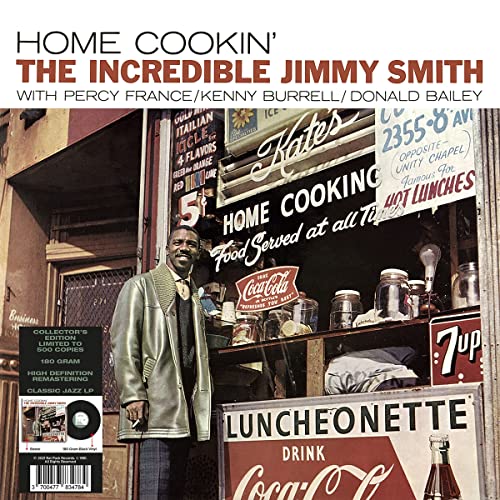 Album cover for “Home Cookin’” by Jimmy Smith, featuring a street scene.