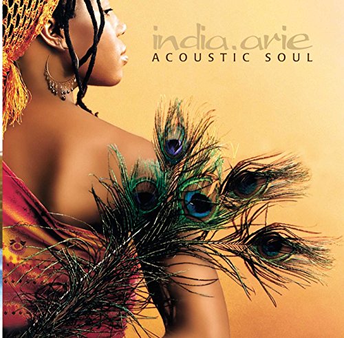 India.Arie “Acoustic Soul” CD cover with a profile and peacock feathers.