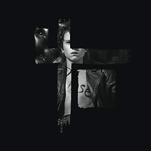 Black and white album cover featuring a man’s face obscured by a cross.