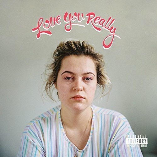 Album cover featuring a person in a striped shirt with "Love You Really" text above.