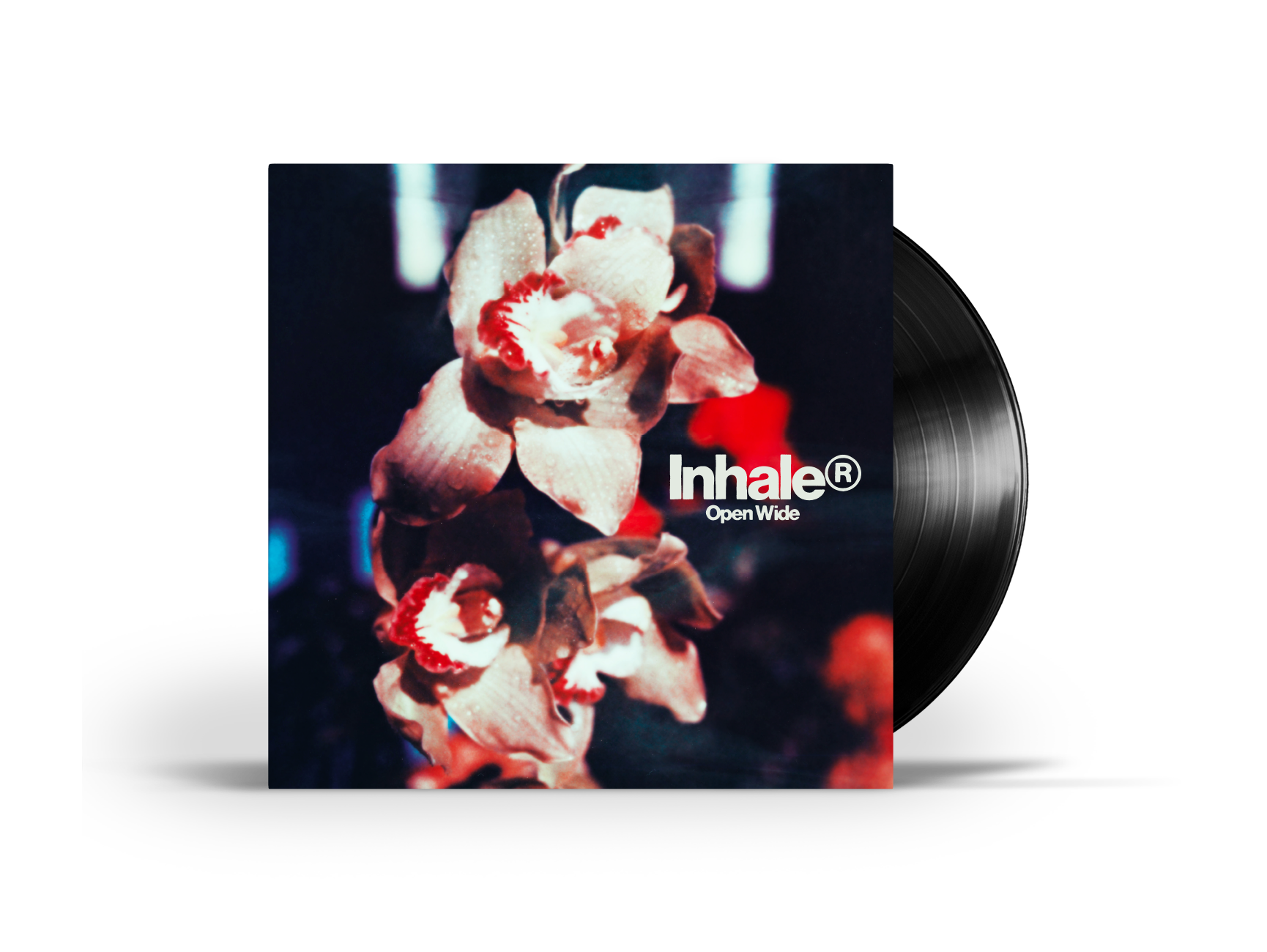 Vinyl record with floral image and the text "Inhale Open Wide".