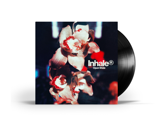 Vinyl record with floral image and the text "Inhale Open Wide".